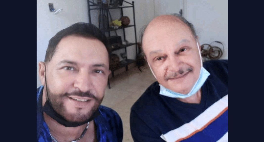 Jorgito Martínez junto a Enrique Molina